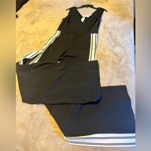 Women’s Paradiso Jumpsuit sleeveless w leg splits Black sz M